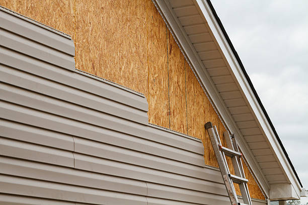 Professional Siding Replacement technician working in Boomer, NC